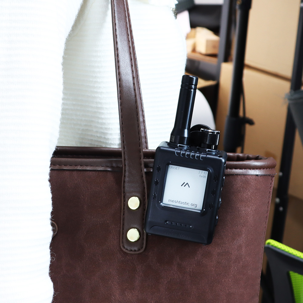 M1 is clipped onto the bag